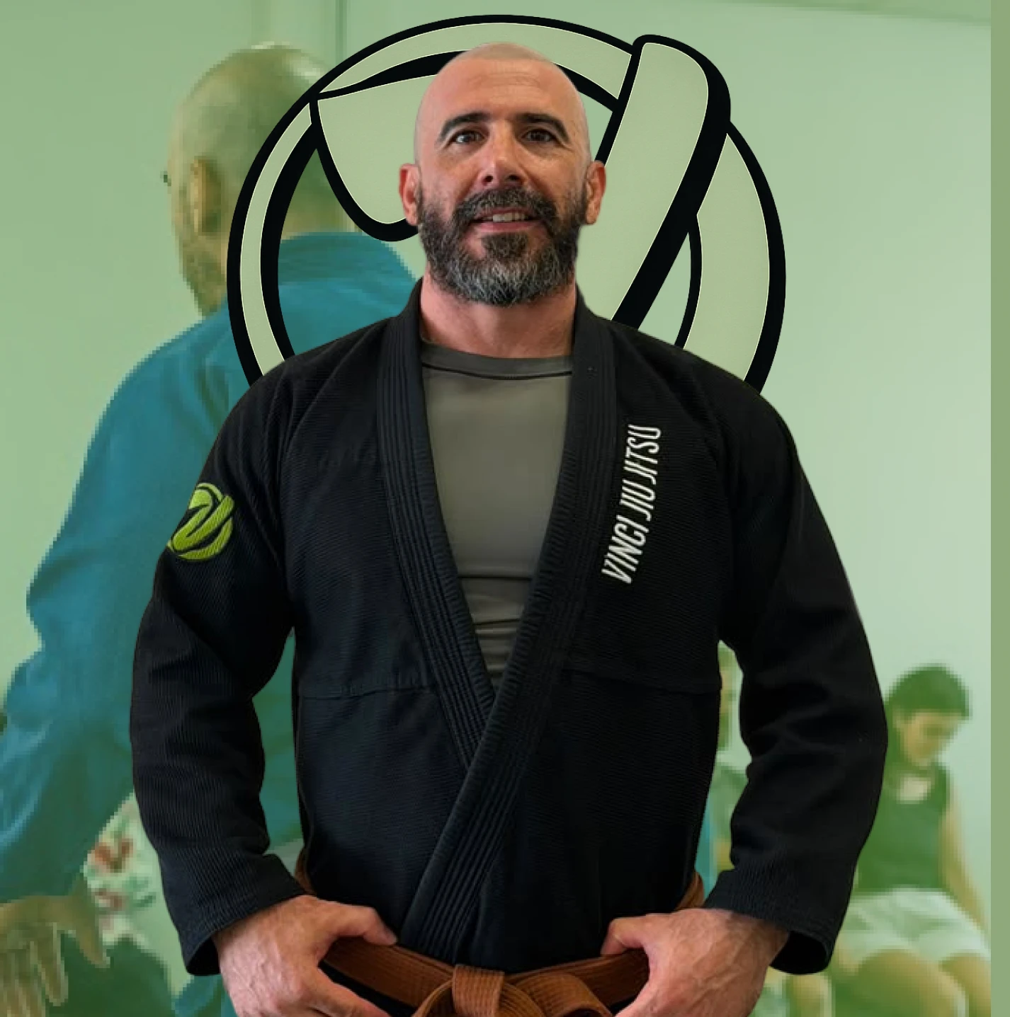 Vinicius Reale, co-founder of Vinci Jiu-Jitsu, smiling in a blue gi